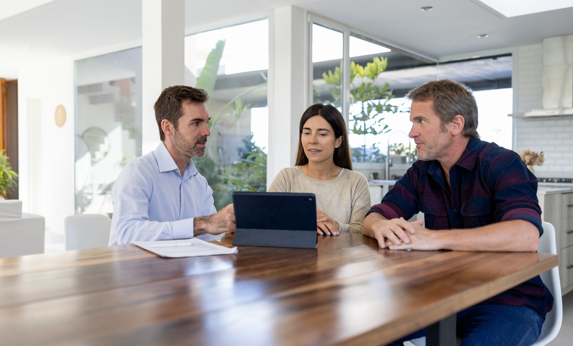 Couple consulting with financial professional