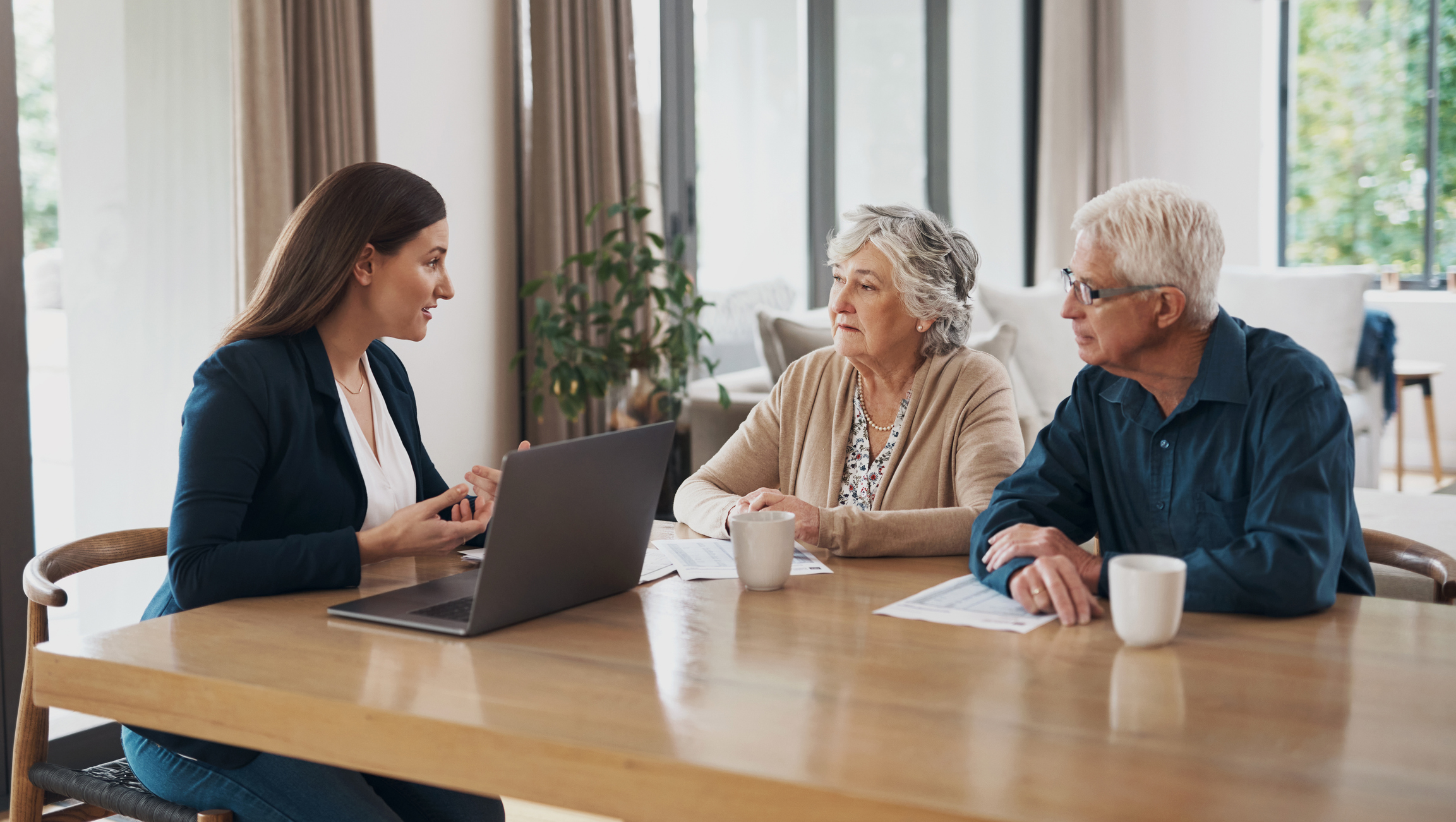 Financial advisor with senior couple