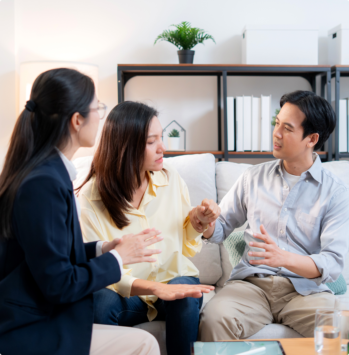 Couple discussing with therapist