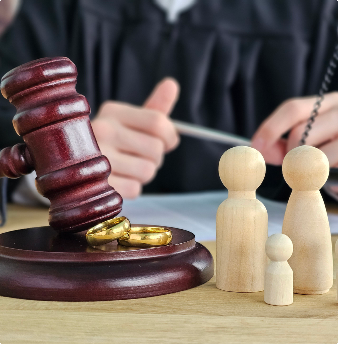 Judge, gavel, rings, family figures for divorce